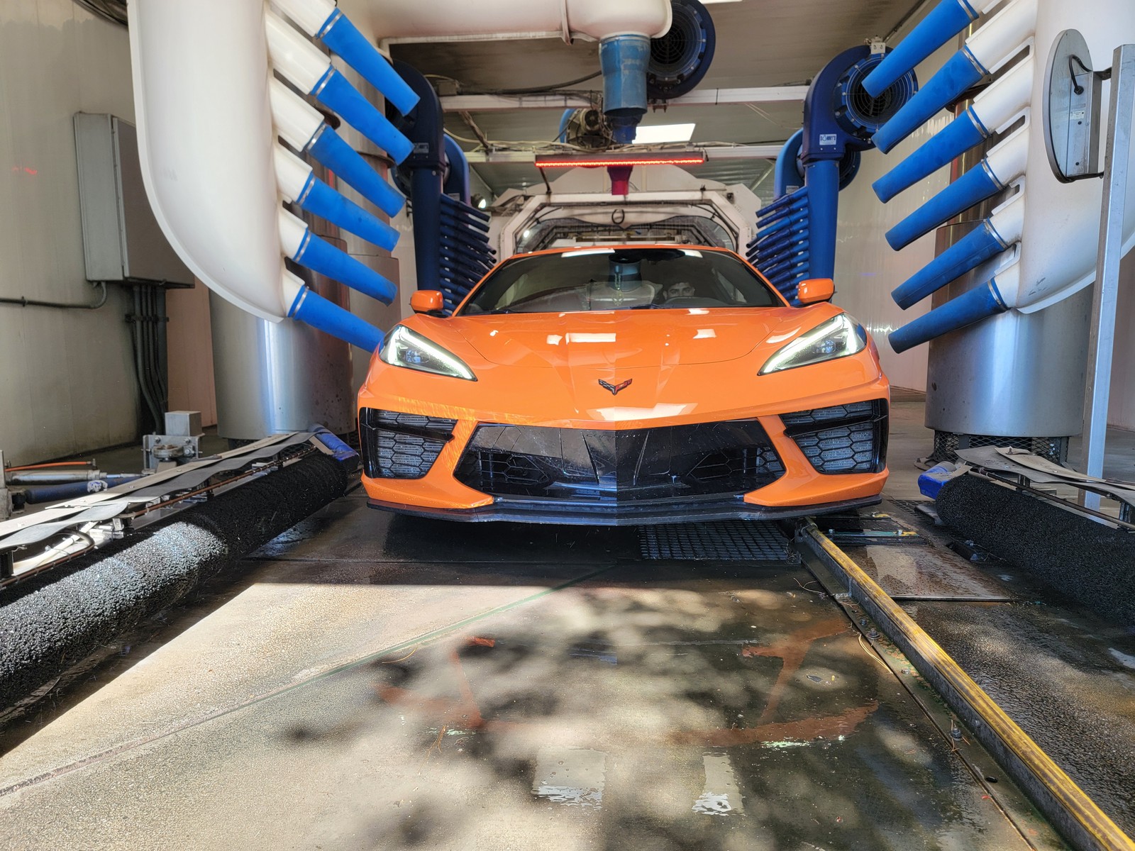 Corvette exiting the Xpress Car Wash power dryer tunnel